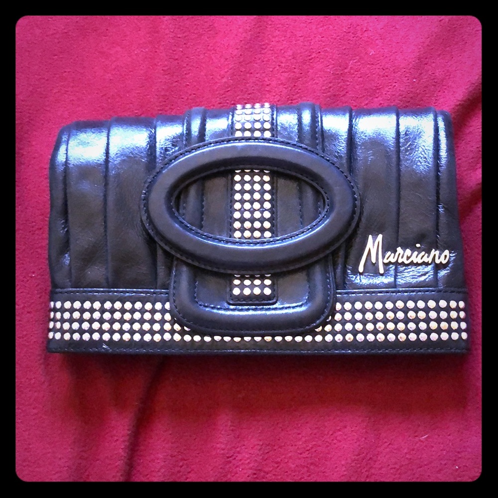 Marciano clutch/wristlet